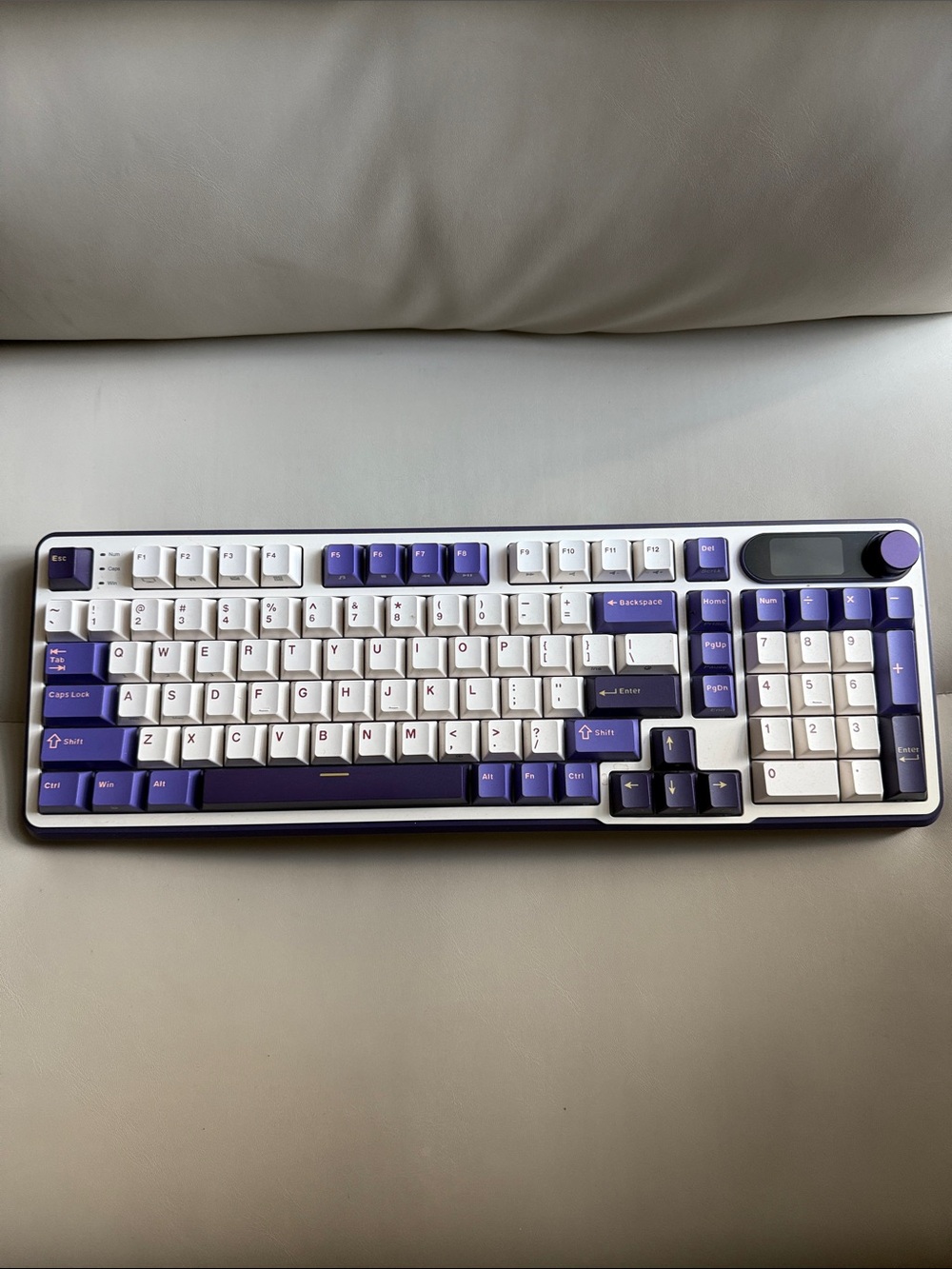 Mechanical Keyboard with Purple and White Keycaps